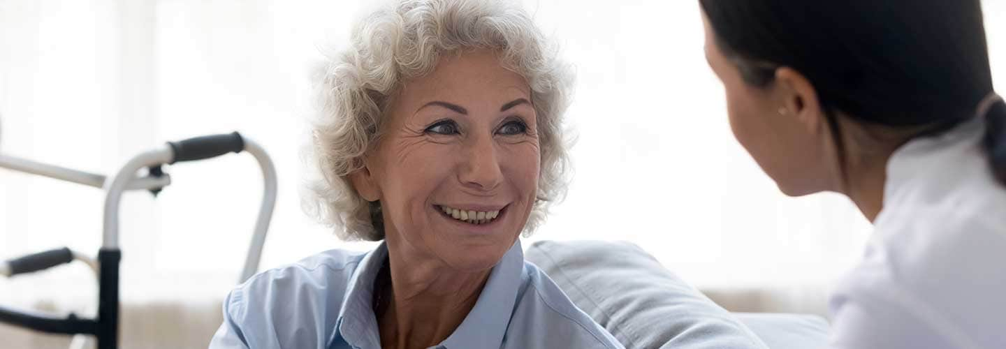 woman smiling at caregiver