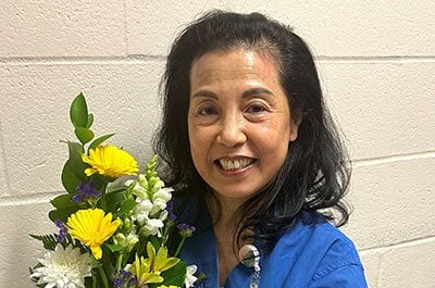 connie mak with flowers