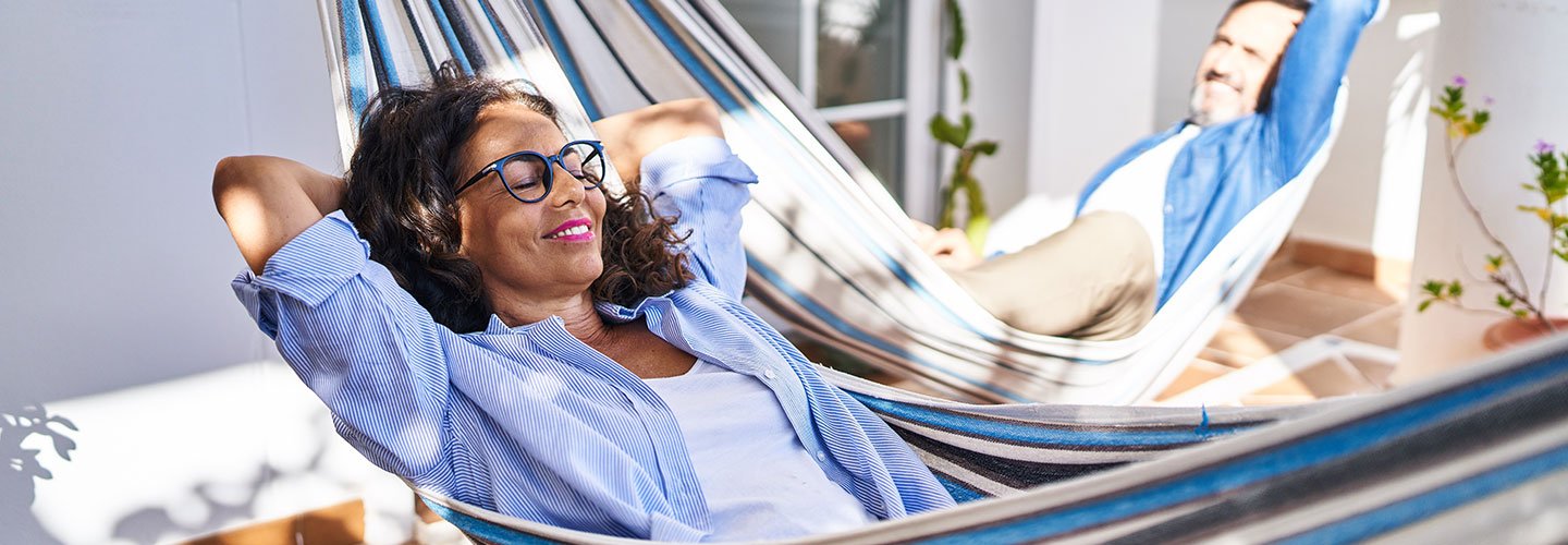 woman relaxing in hammock